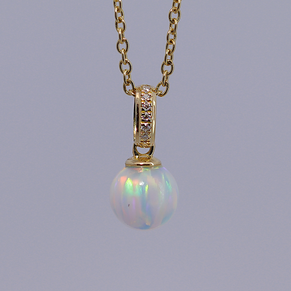 18K Gold Pendant with Stone and Pearl